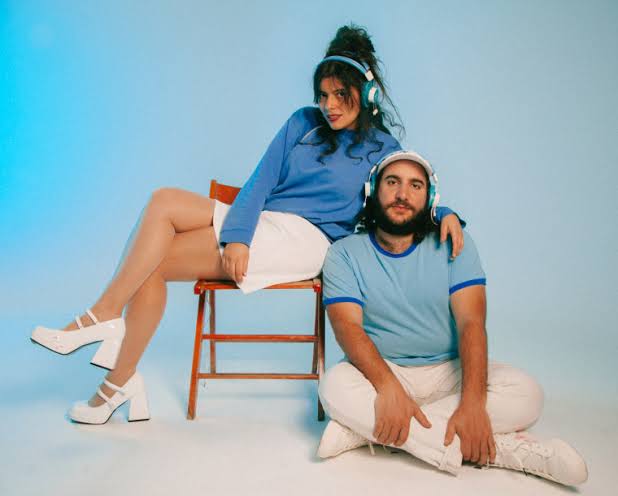 Pearland the Oysters male/female duo dressed in tennis clothes press image