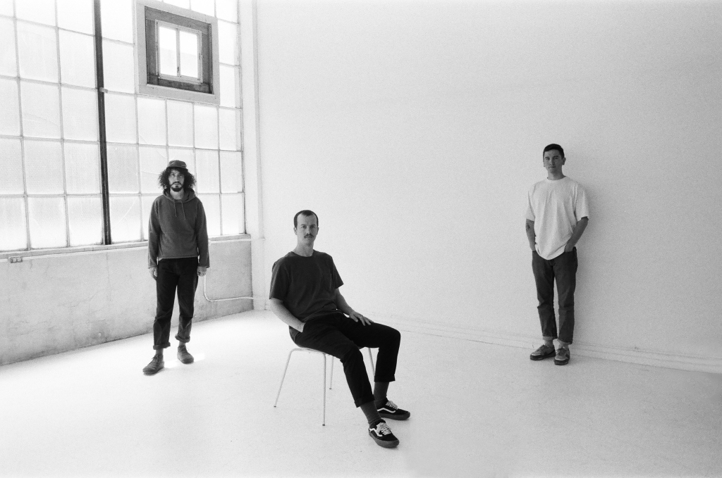 Racoma band, press picture in a white room