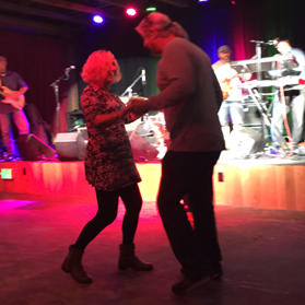 Owners, Paul and Kelly Boisclair dance at The Siren 